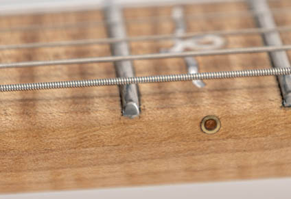 STAINLESS STEEL FRETS AND ROUNDED FRETBOARD EDGES